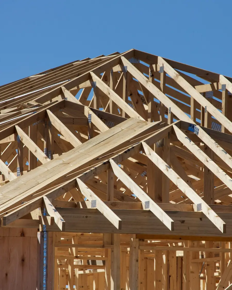 House under construction with new roof framing